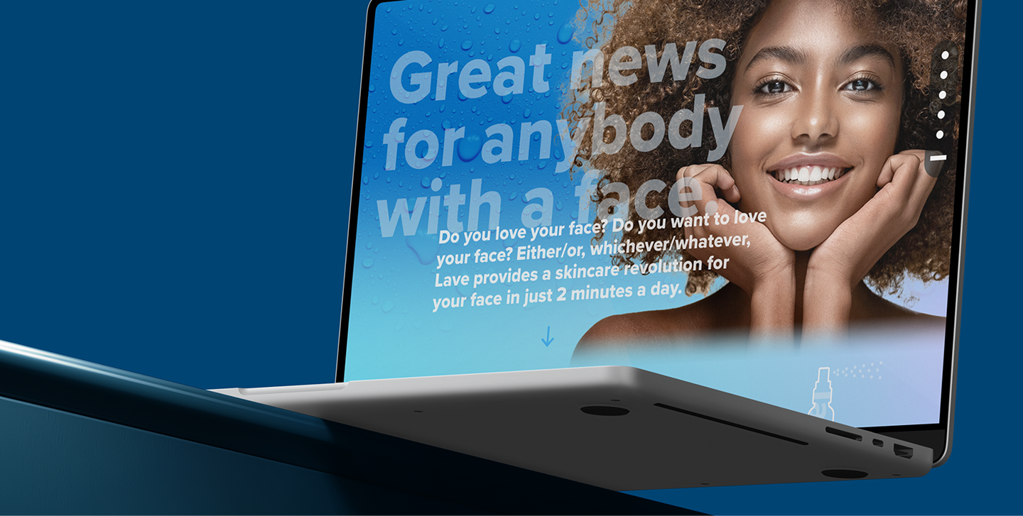 Lave website open on a laptop showing a model smiling