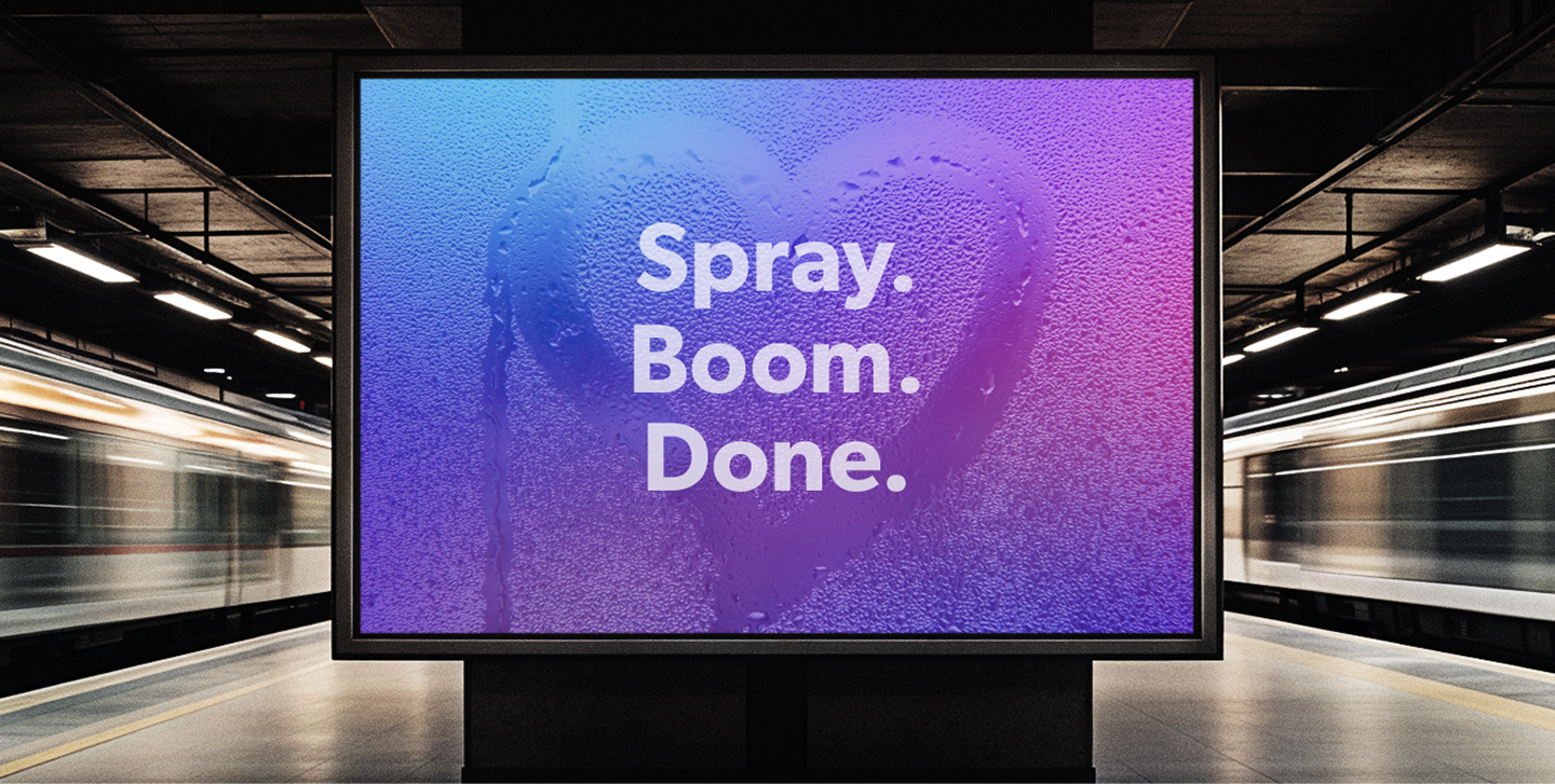 Subway billboard ad reading Spray Boom Done on a heart drawn in condensation